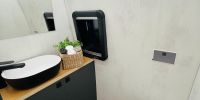 Wiemobil MAN TGE 720 mit schickem neuen Baddesign und Standwaschbecken